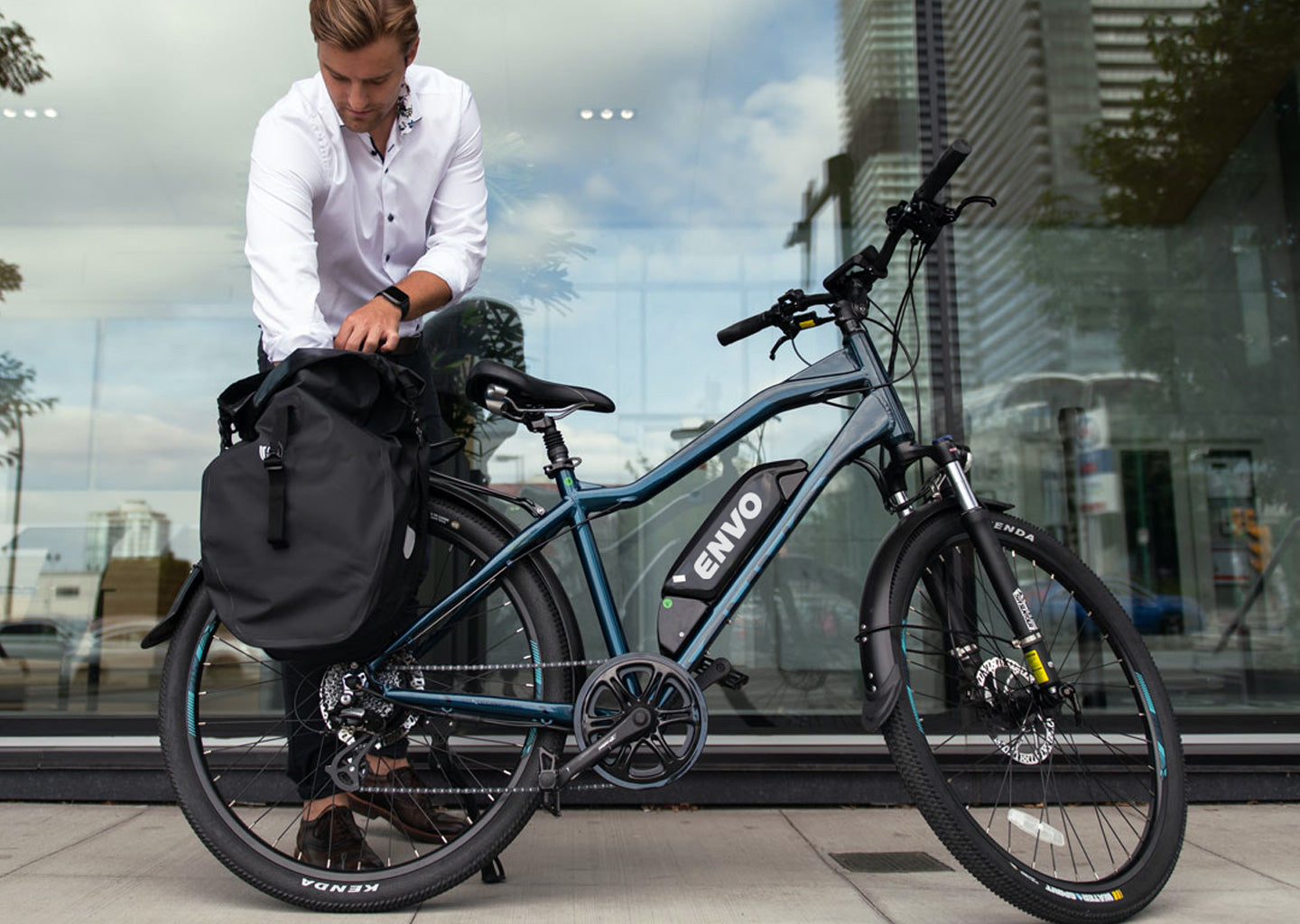 adult using ebike carrying bag